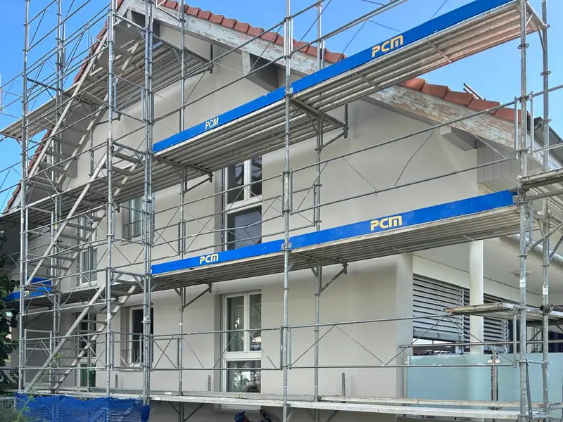 Travaux en hauteur sur un immeuble — chantier LT Couverture